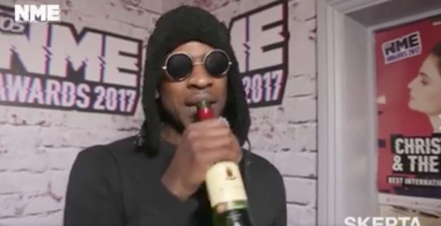 Skepta Confused A Bottle Of Jameson For A Microphone During An Interview