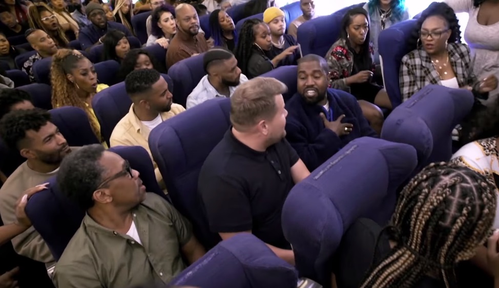 Watch Kanye, James Corden & The Entire Sunday Service Choir Sing On A Plane