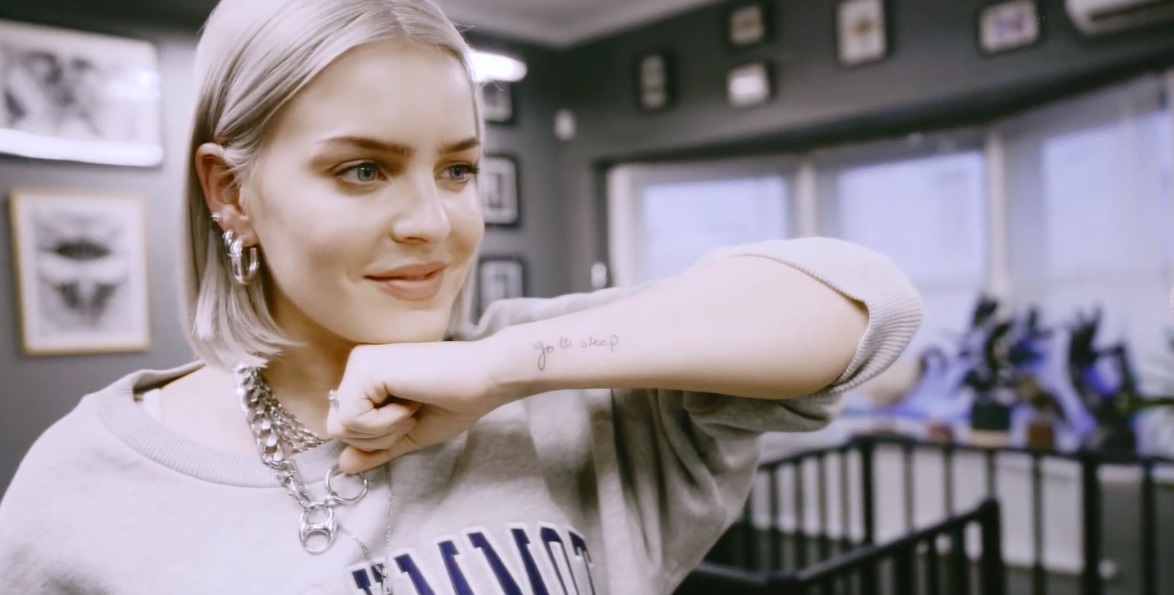 Watch Anne-Marie Tell Us About Her Tattoos & Get A New One In Melbourne