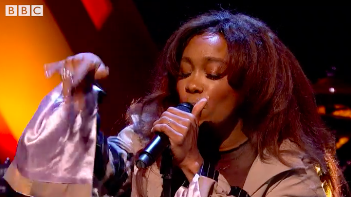 Watch SZA Soar Through A TV Performance Of 'Normal Girl'