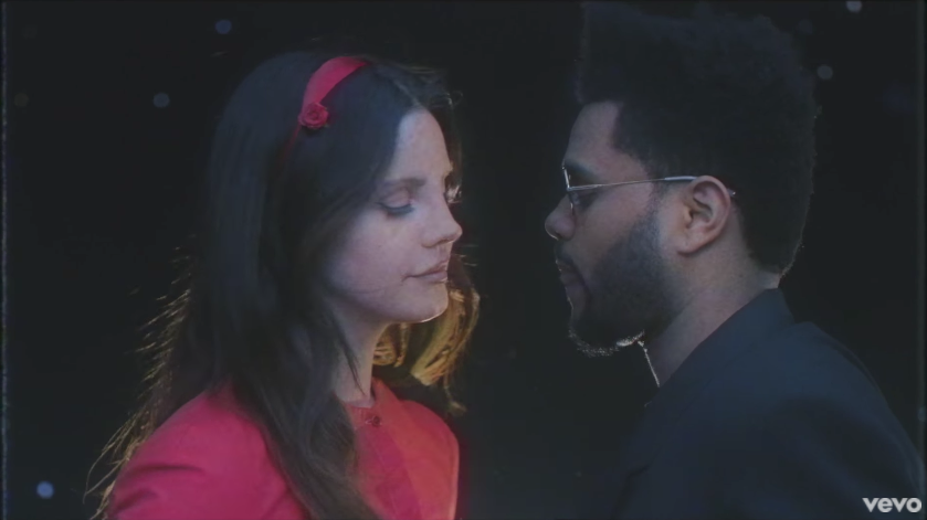 Lana Del Rey Sits Atop The Hollywood Sign With The Weeknd In The 'Lust For Life' Video